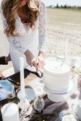 Bride Cutting Simple White Cake